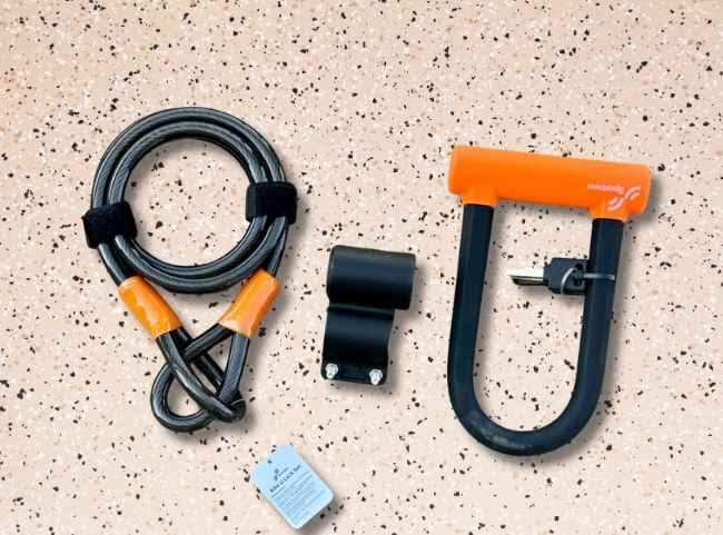 Complete Sportneer bike lock on front tire