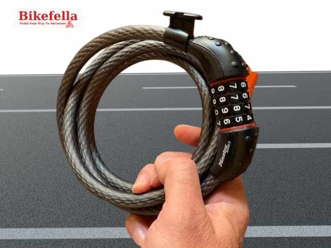 Master Lock cable lock securely held in hand
